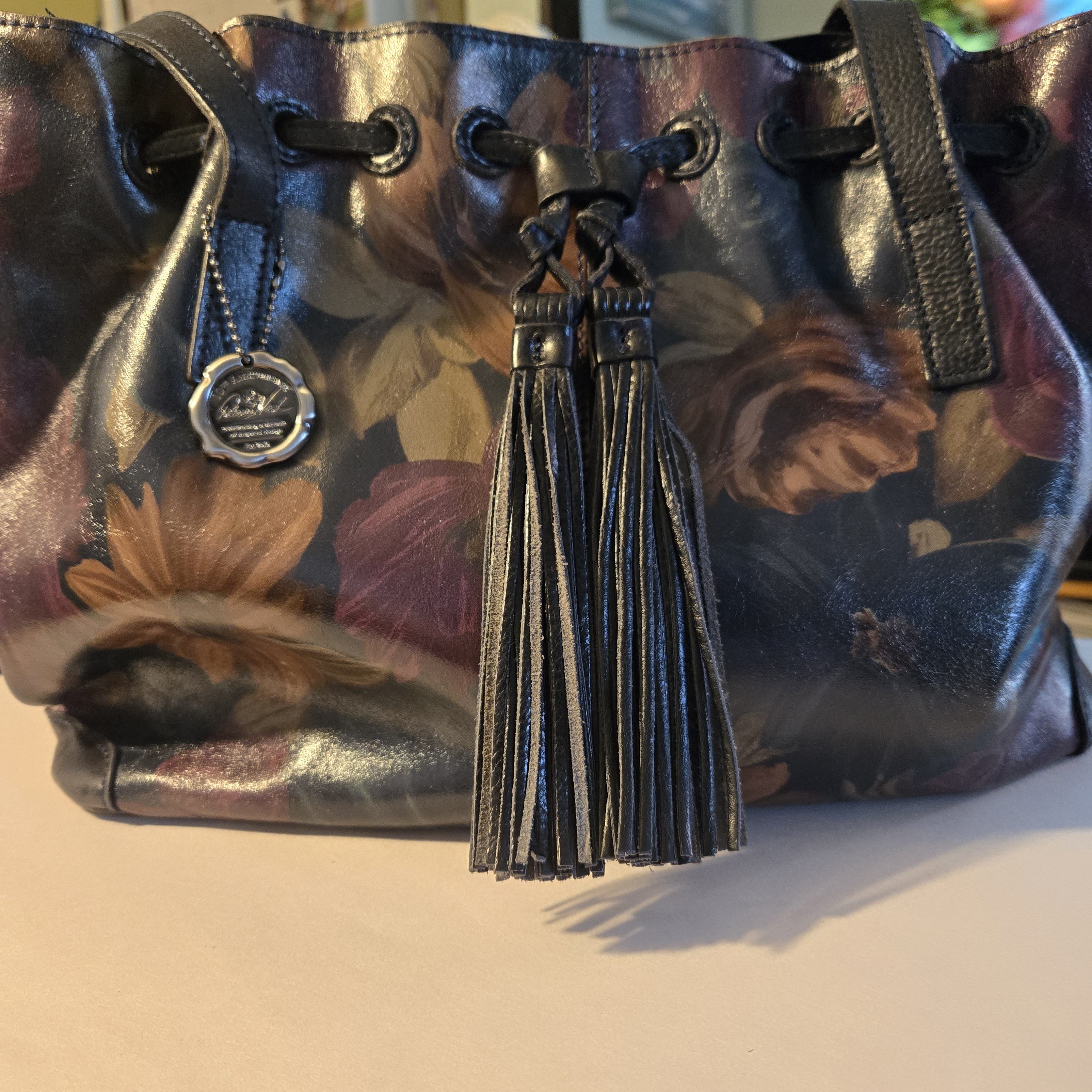 Patricia Nash "Witney" Tasseled Drawstring Floral Tote Bag With Classic Design